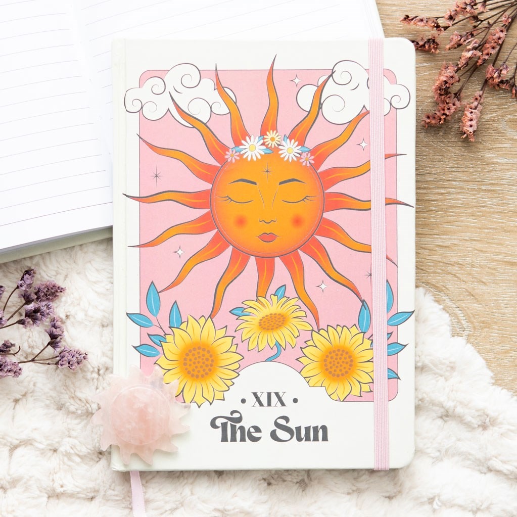 Caderno A5 The Sun Celestial com design celeste e luminoso na capa