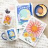 Caderno A5 The Sun Celestial com design celeste e luminoso na capa
